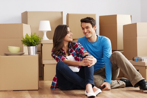 Young couple moving in their new house