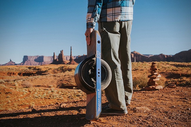 guy with one wheel board