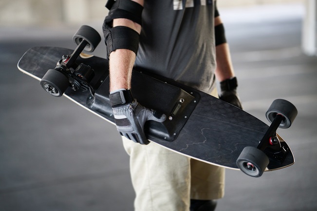 guy holding e-board