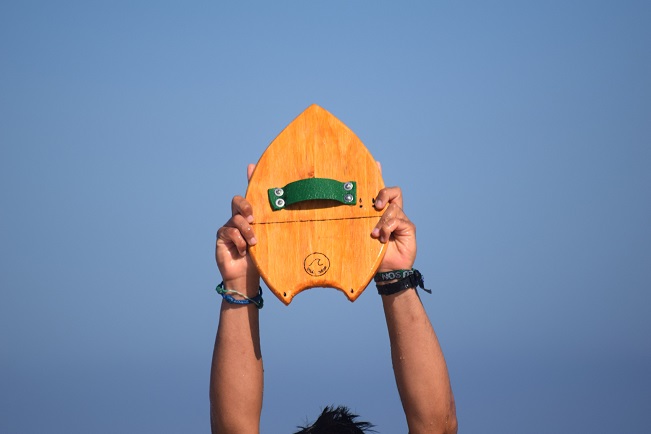 guy holding handboard