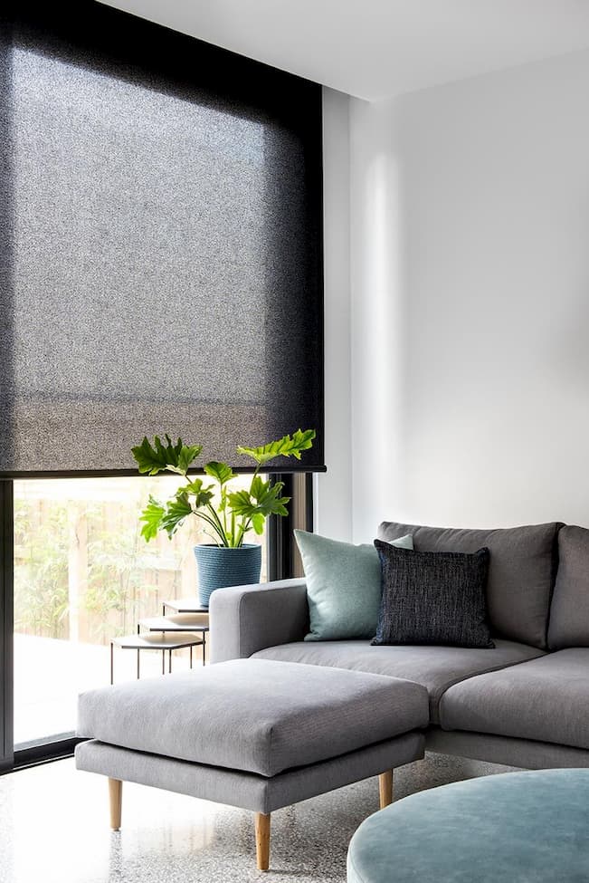 roller modern blinds for living room with grey soga bed and side tables