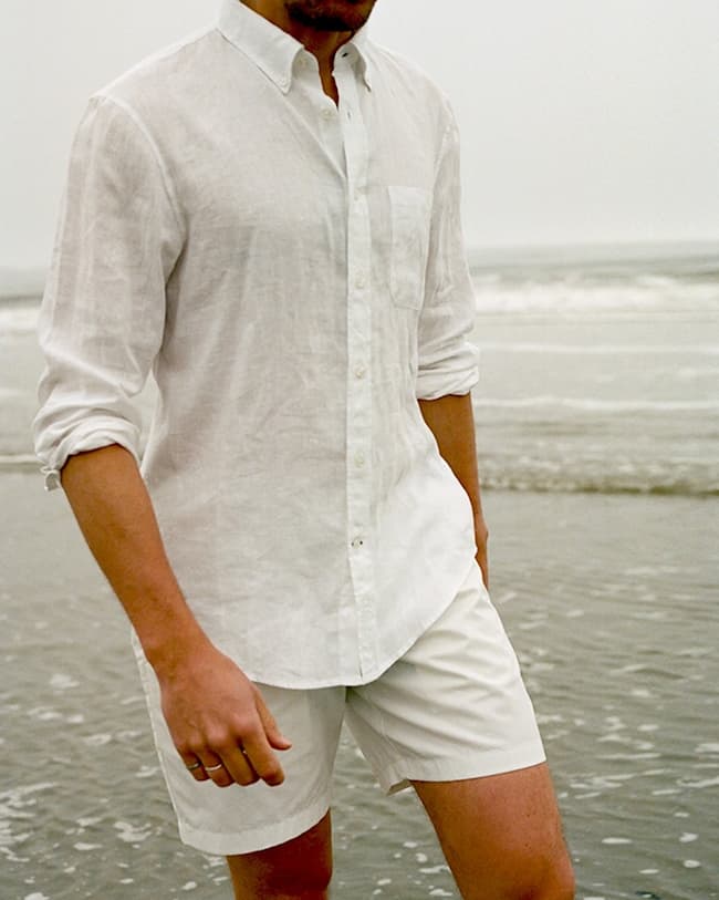 man with linen shirt and cotton shorts