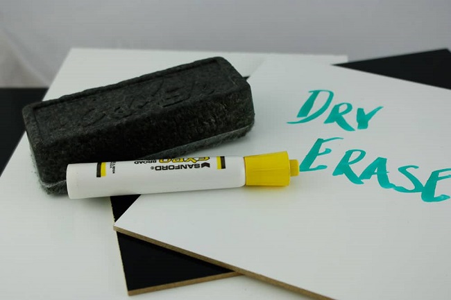 close-up of dry board marker and eraser 