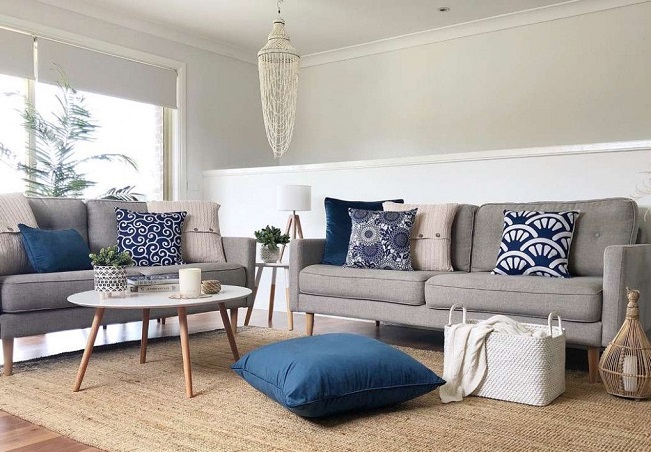 Blue decorative cushions on sofa