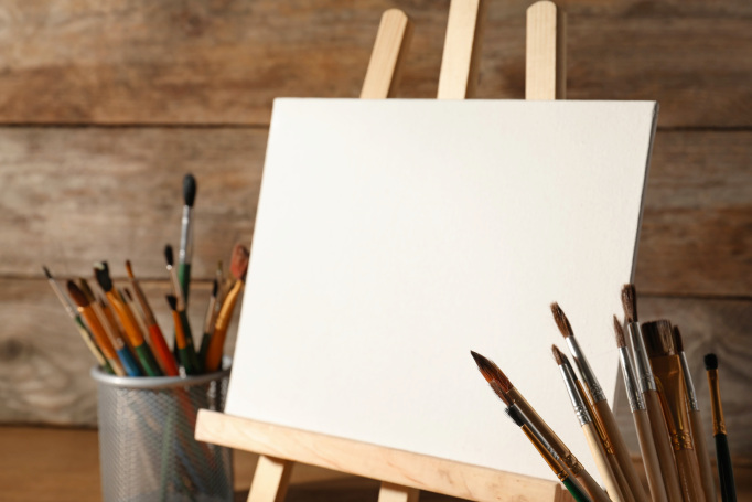 Close-up Of Artist Starting To Paint On A Blank Canvas On An Easel, Ready  For Adding Your Own Image Or Text Or Design Stock Photo, Picture and  Royalty Free Image. Image 16428239.