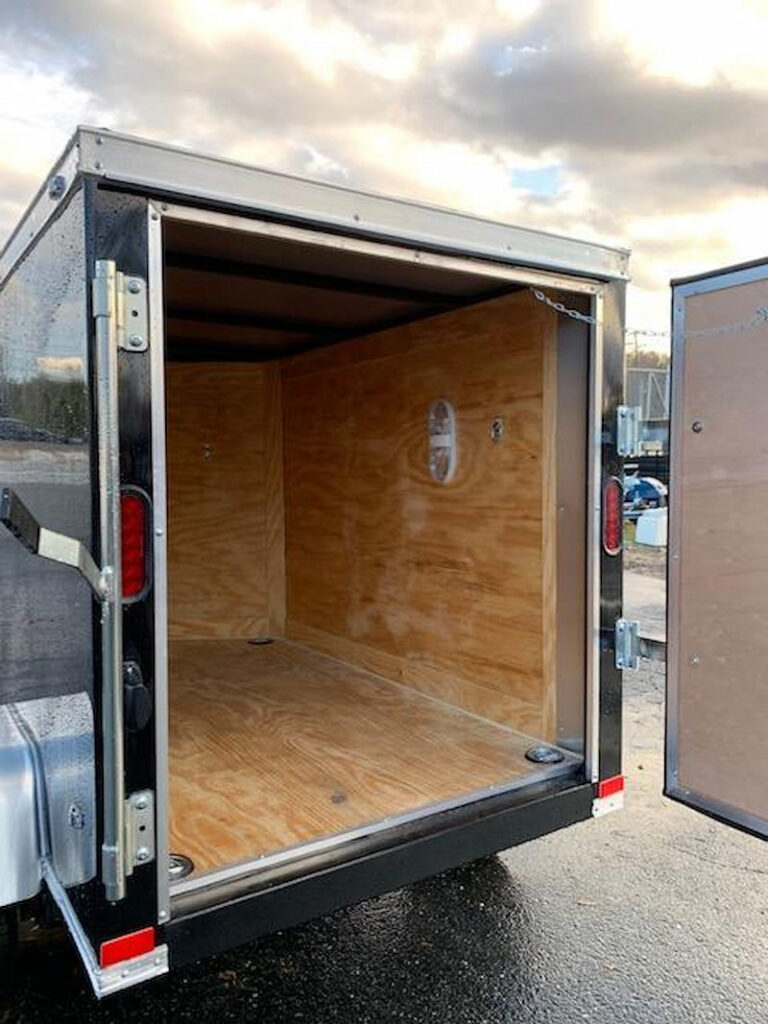 Storage enclosed trailers