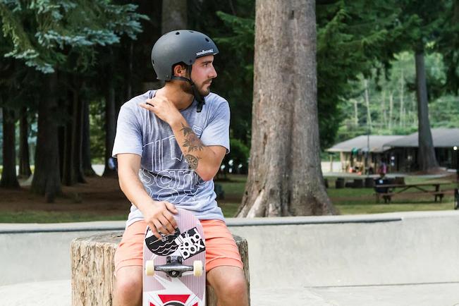 Man with a skateboard helmet