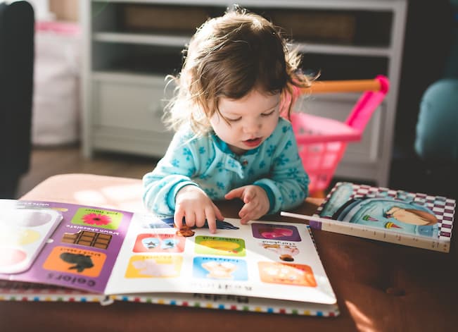 Kid reading a book