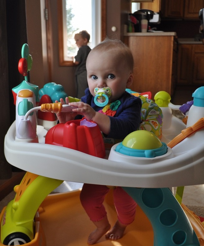 picture of a baby in activity walker