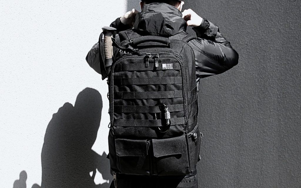 Man wearing modern tactical bag