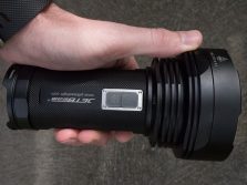 Photo of hand-held JetBeam T6 flashlight