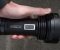 Photo of hand-held JetBeam T6 flashlight