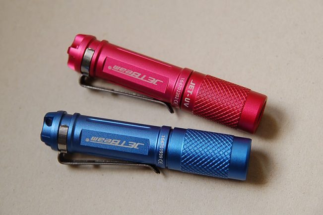 Red and blue JetBeam JET-UV flashlights