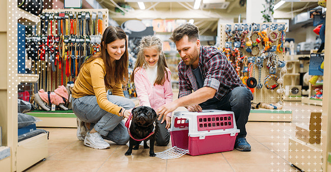 family buying supplies for its dog