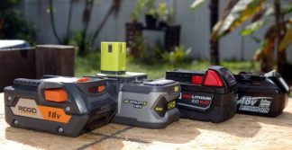 Close-up of 4 batteries for power tools