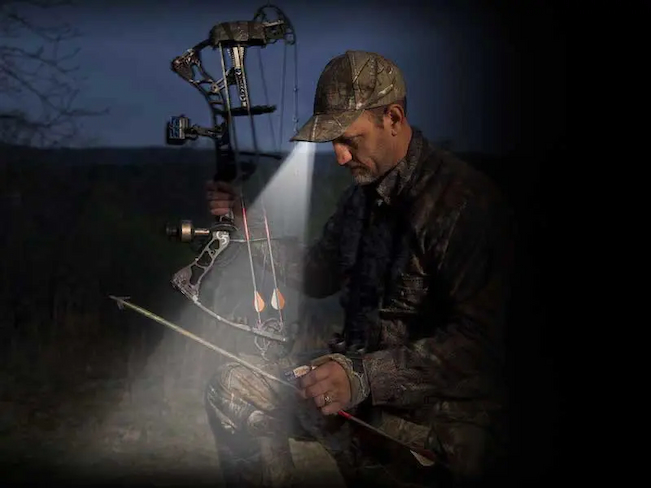 man wearing headlamp in hunting areas
