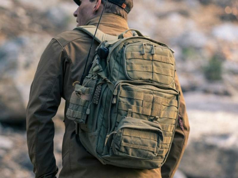 Man wearing a tactical backpack