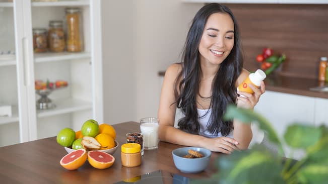 woman taking supplements