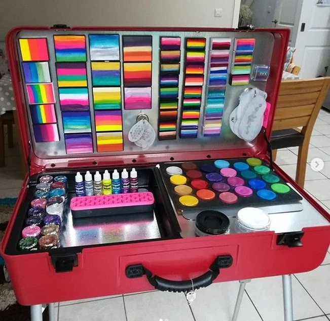 body paint supplies in a suitcase