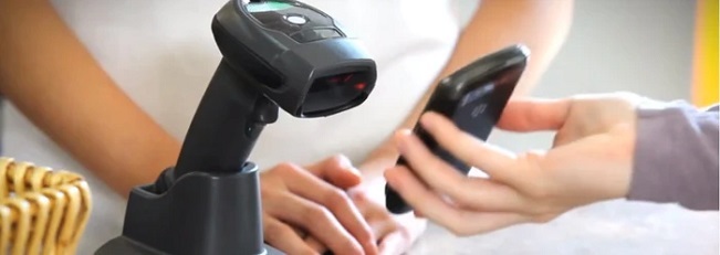 person using barcode scanner