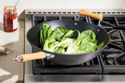 cooking with wok pan