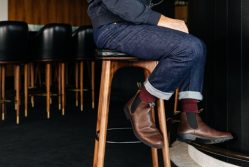 A man wearing Blundstone boots
