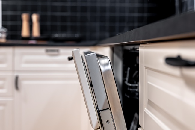close up of open dishwasher